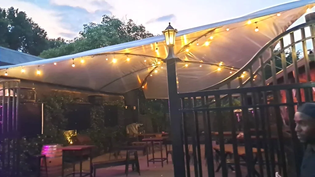 Commercial shade sail installation in Parkhurst, Johannesburg for outdoor seating area