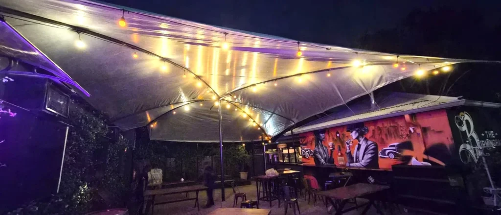 Restaurant shade sail installed in Parkhurst, Johannesburg for patio sun coverage.